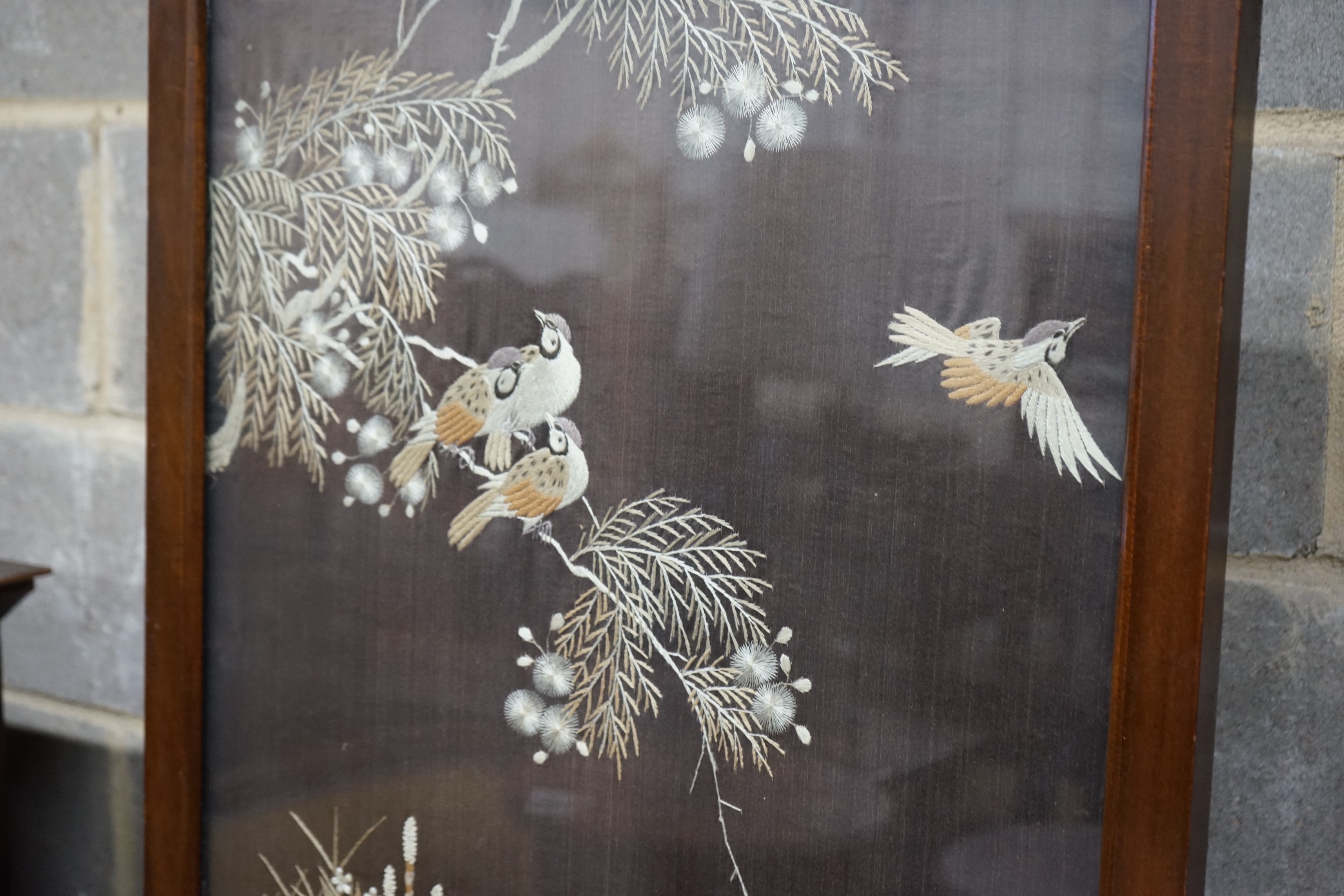 An Art Deco style rectangular mahogany fire screen inset Chinese silkwork panel, width 66cm, height 74cm